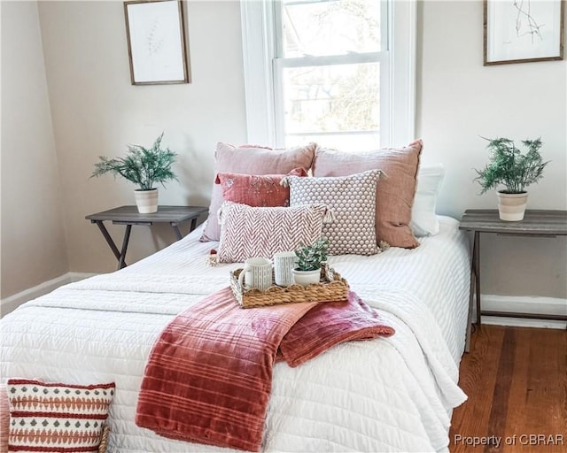 bedroom featuring dark hardwood / wood-style floors