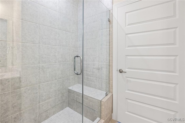 bathroom featuring walk in shower