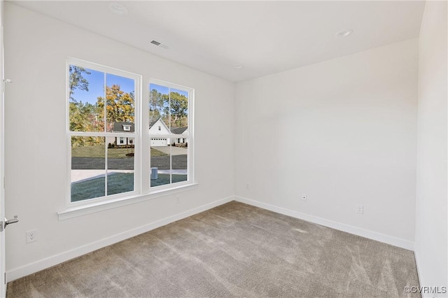 view of carpeted spare room