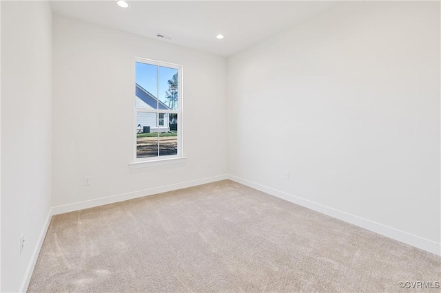 view of carpeted spare room