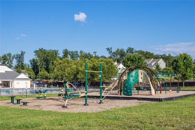 view of jungle gym with a lawn