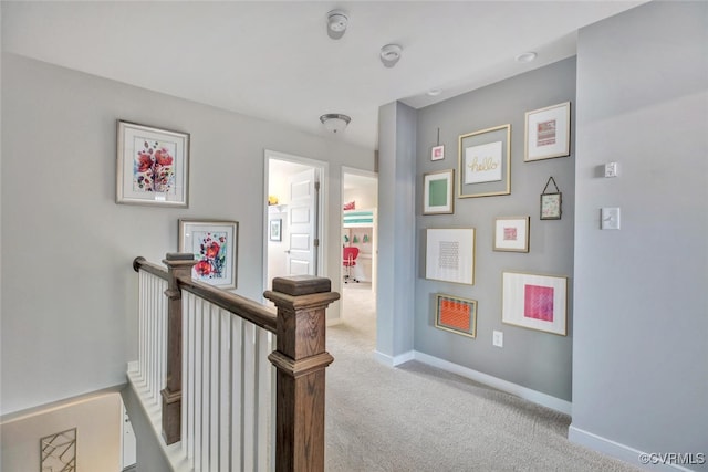 hallway with light carpet