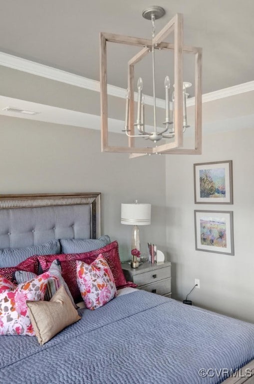 bedroom featuring crown molding