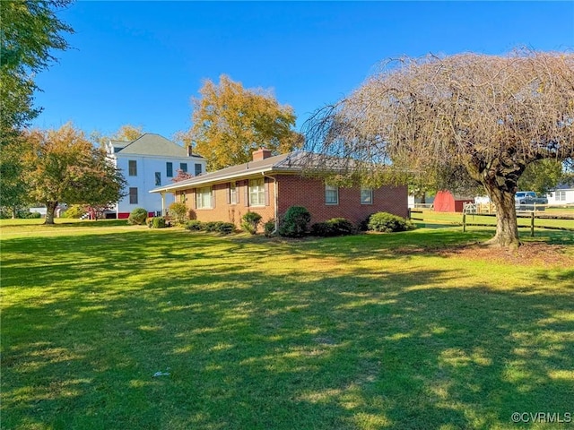 exterior space with a lawn