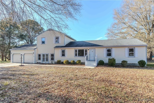 front of property with a garage