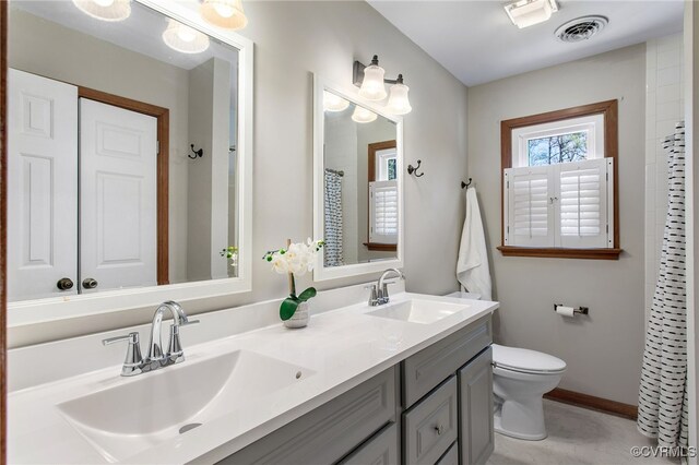 11741 Riverpark Dr, Chesterfield, VA 23838 - full bath featuring toilet, double vanity, a sink, and visible vents