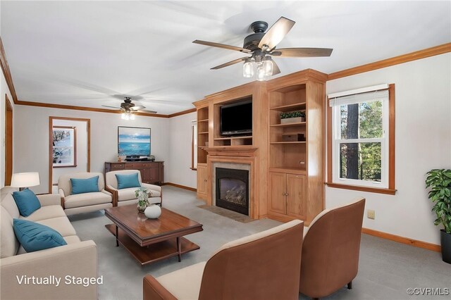 11741 Riverpark Dr, Chesterfield, VA 23838 - living room with light carpet, ceiling fan, crown molding, and a fireplace