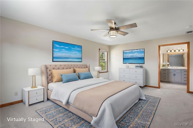 11741 Riverpark Dr, Chesterfield, VA 23838 - bedroom featuring baseboards, ensuite bath, and light carpet