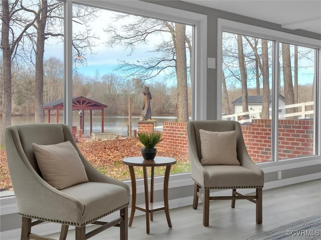 sunroom with a water view