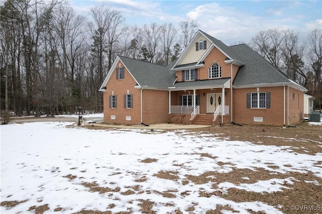 view of front of house featuring central AC and a porch