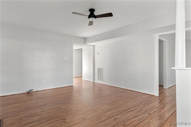 unfurnished room with ceiling fan and light wood-type flooring