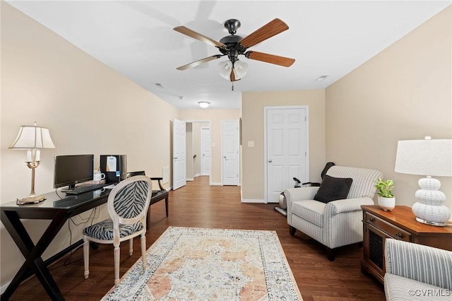 office area featuring dark hardwood / wood-style floors and ceiling fan