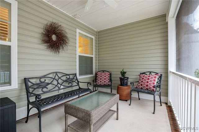 view of patio featuring ceiling fan