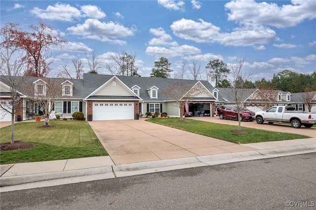 view of front of house featuring a garage and a front yard