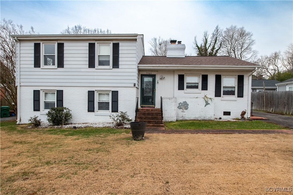 view of front of home with a front yard