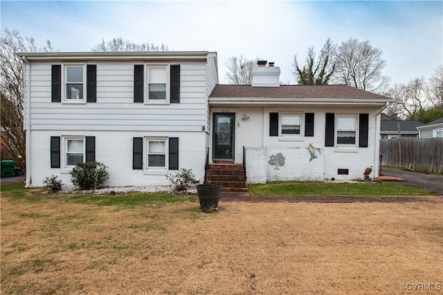 view of front of home with a front yard