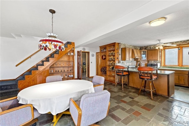 dining area featuring ceiling fan