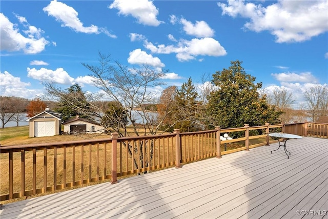 wooden terrace featuring a shed