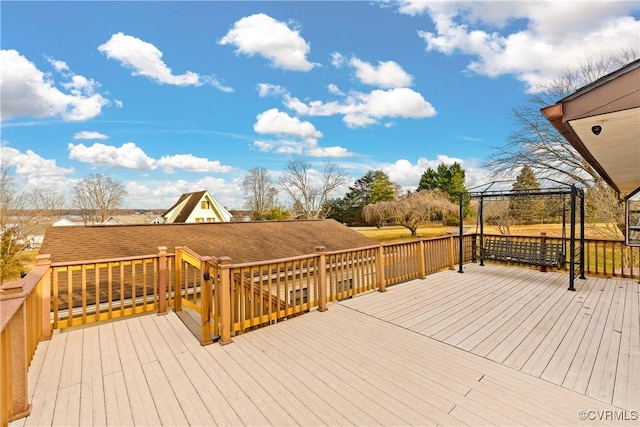 wooden deck with a gazebo