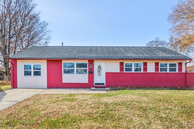 ranch-style house with a front lawn