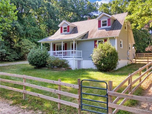 cape cod house featuring a front yard and a porch