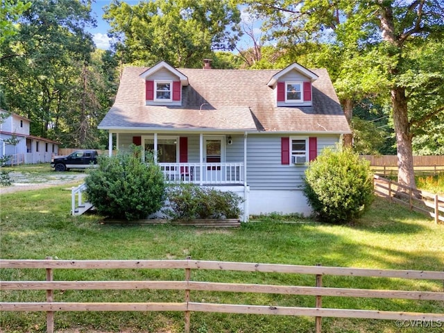 cape cod home with cooling unit, a front lawn, and a porch