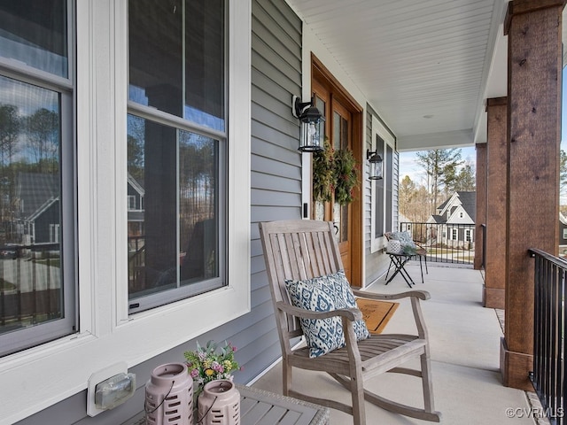 balcony featuring covered porch