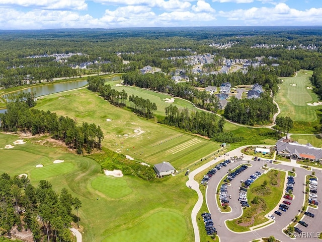 aerial view with view of golf course and a water view