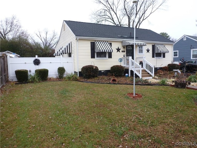 view of front of house with a front yard