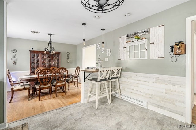 dining room featuring hardwood / wood-style floors and ceiling fan