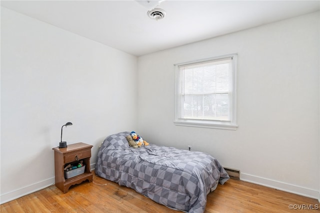 bedroom featuring light hardwood / wood-style flooring