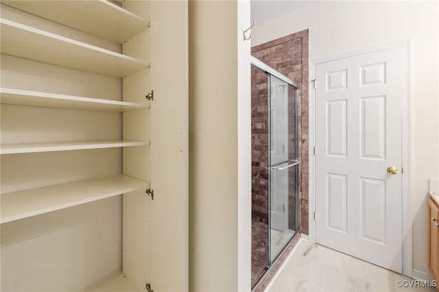 bathroom featuring vanity and walk in shower