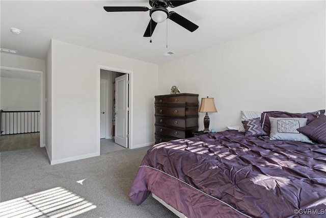 bedroom featuring ceiling fan and light carpet