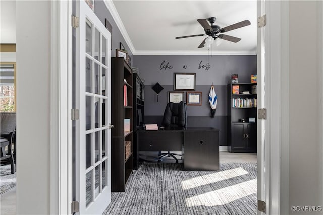 office space featuring ceiling fan and ornamental molding