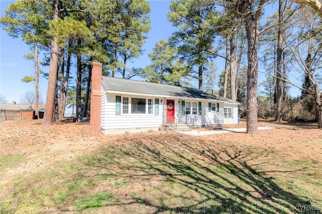 ranch-style home with a chimney and crawl space