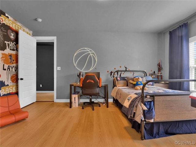 bedroom featuring light hardwood / wood-style floors