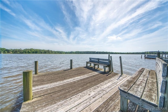 view of dock with a water view