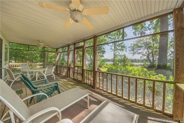 sunroom / solarium with ceiling fan