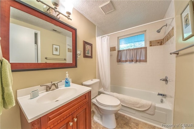 full bathroom featuring vanity, shower / bath combination with curtain, a textured ceiling, and toilet