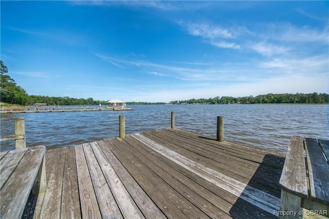 view of dock with a water view