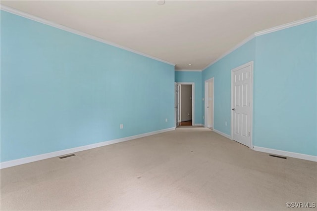 carpeted empty room with crown molding