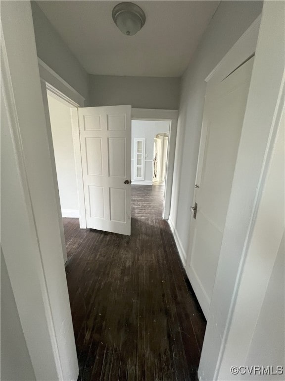 hallway featuring dark hardwood / wood-style floors