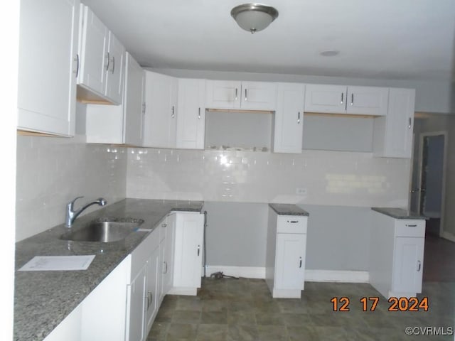 kitchen with white cabinets and sink