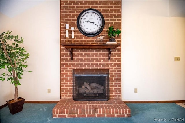 unfurnished living room with a fireplace and dark carpet