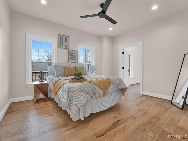 bedroom featuring ceiling fan and light hardwood / wood-style floors