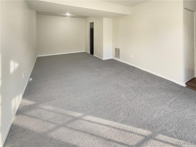 interior space with dark colored carpet