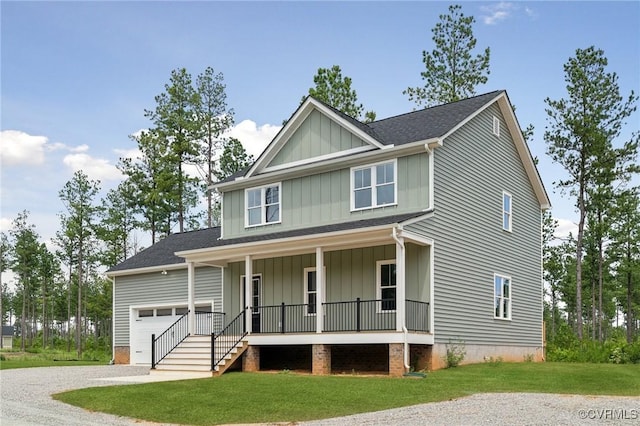 craftsman inspired home featuring a porch and a front yard