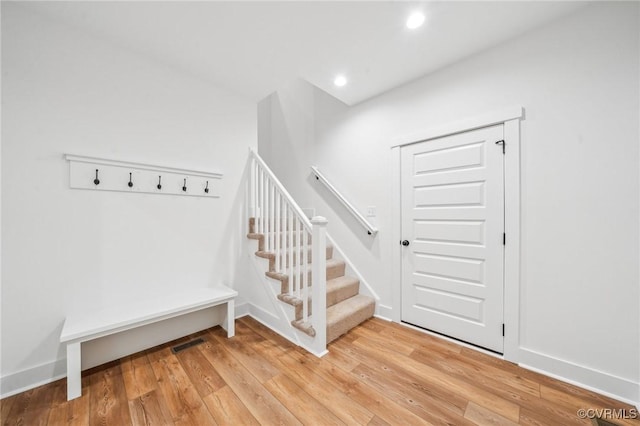 2467 Judes Ferry Rd, Powhatan, VA 23139 - stairway with baseboards, wood finished floors, visible vents, and recessed lighting