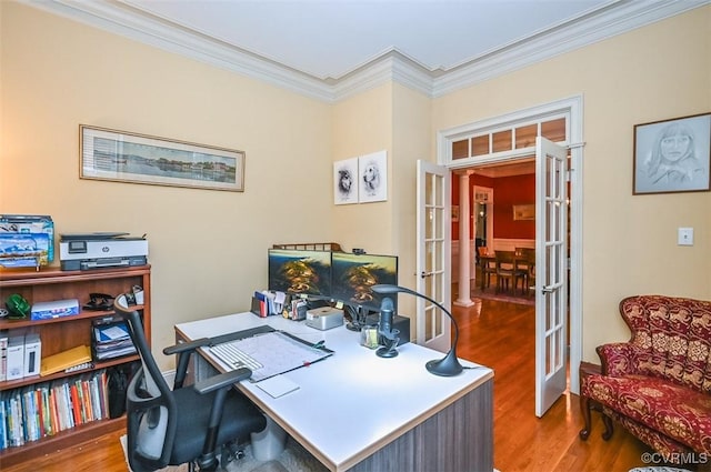 office with ornamental molding, french doors, baseboards, and wood finished floors