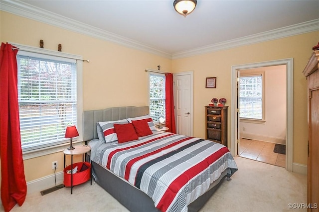 tiled bedroom with visible vents, carpet, baseboards, and ornamental molding